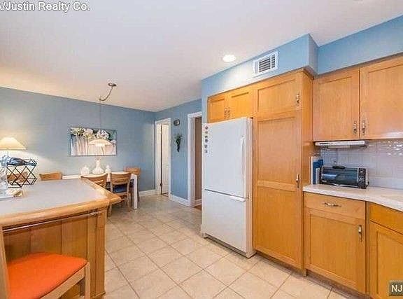 Kitchen, eat-in dinning and half bath