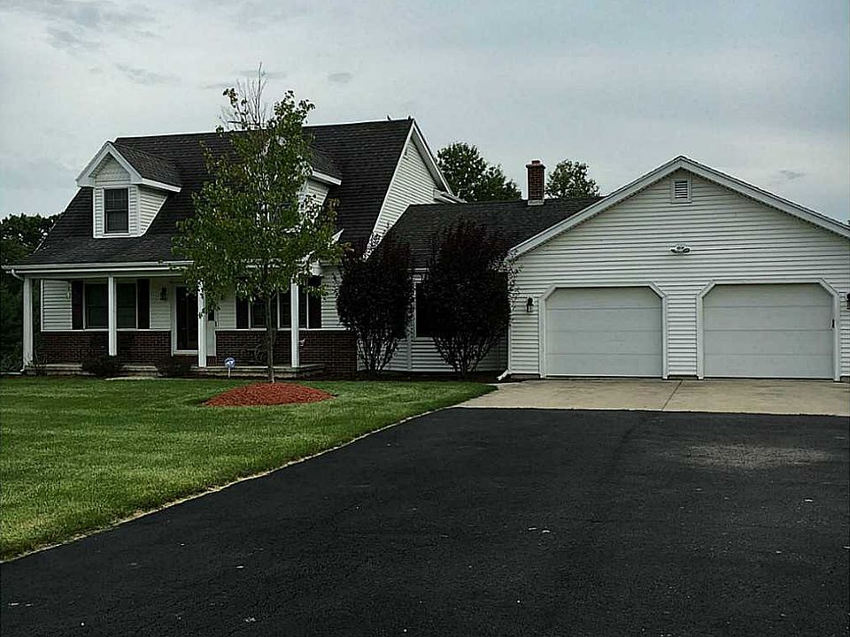 Lanscaped AND a 2 car garage