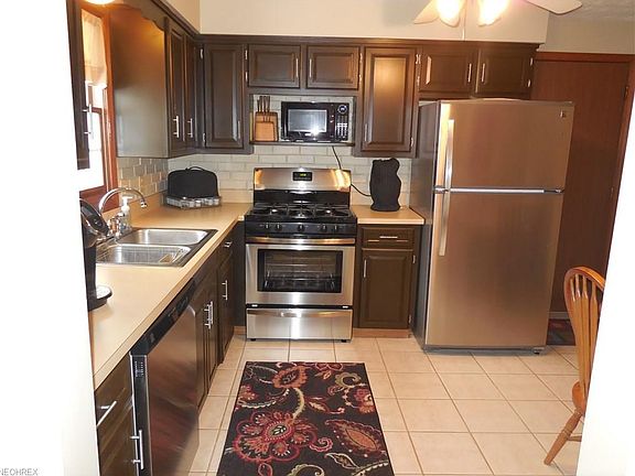 eat in Kitchen with newer stainless steel  appliances, ceramic floor