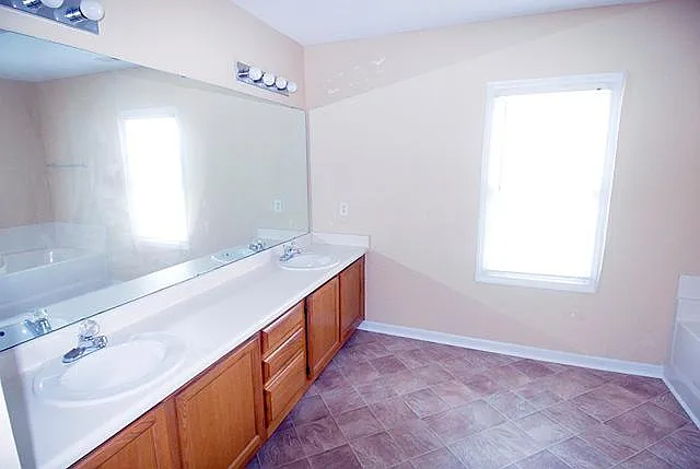 Master Bath - We have renovated flooring to LVL planks.