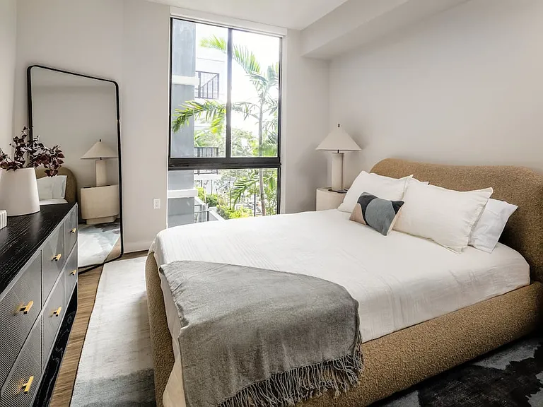 Bedroom with hard-surface vinyl plank flooring