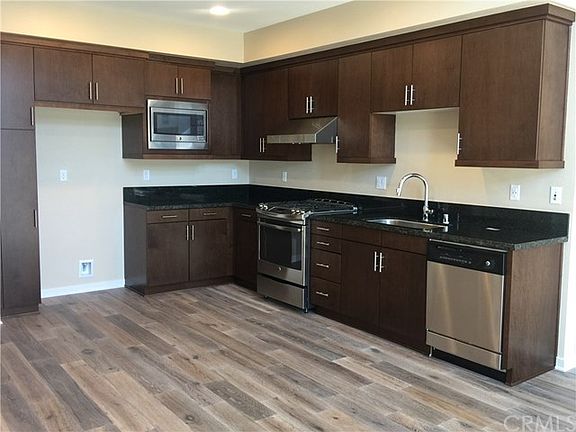 2nd image of 1506 W Artesia Sq APT E