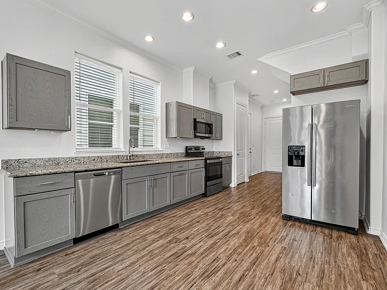 Stainless steel appliances included with the home.