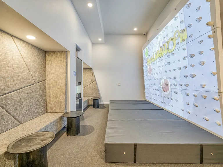 Rock climbing simulator with interactive games