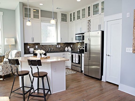 Open floor plan from dining area to kitchen and living room