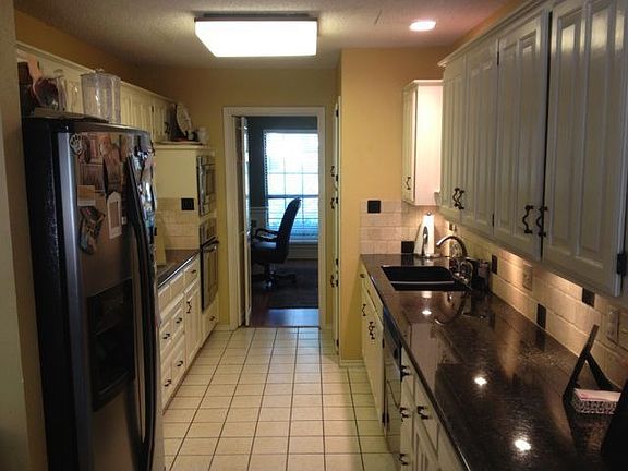 Large kitchen with granite