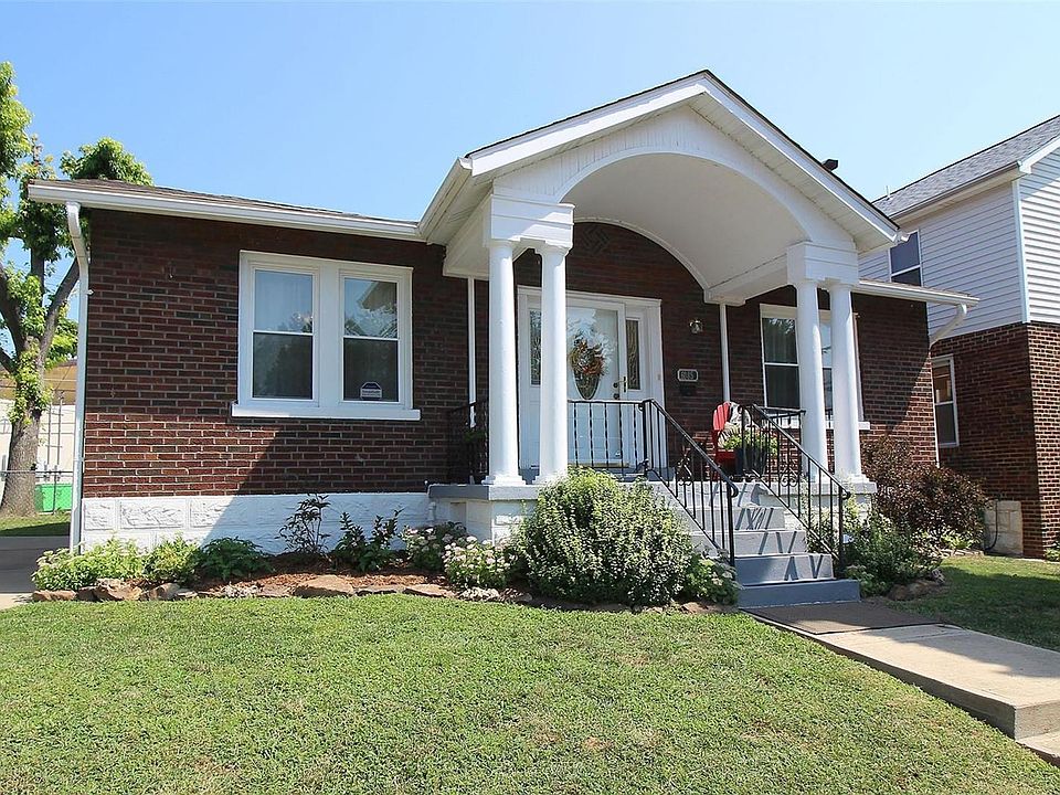 Welcome home to your updated brick home with a gorgeous covered front patio/entrance!