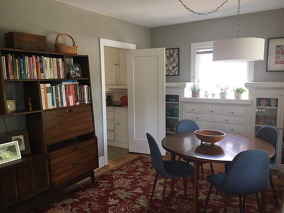 Dining room featuring original built-ins.