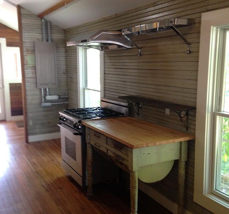 Antique bread table, pot rack, gas stove