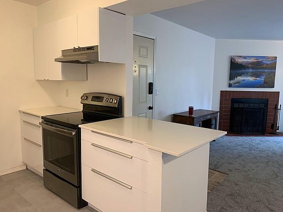 Quartz counter tops and lots of storage with deep drawers