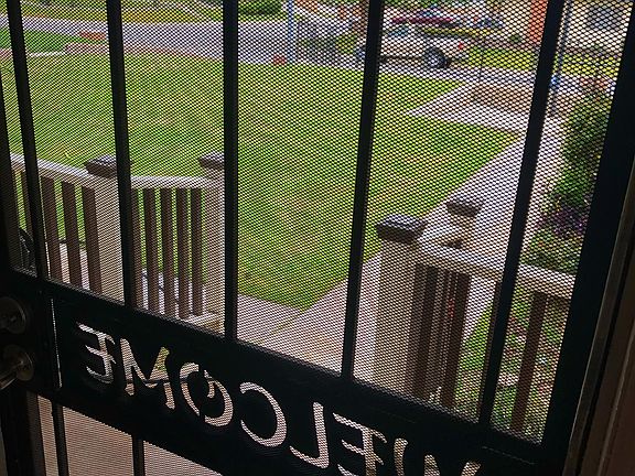 Nice view of neighborhood and lower parking area from front door.