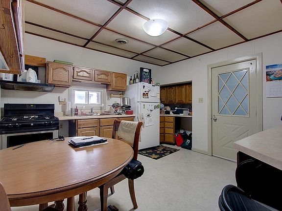 Kitchen and entry to unit