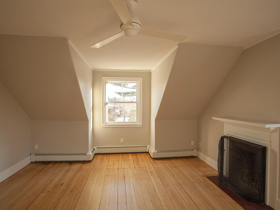 Living Room with ornamental fireplace