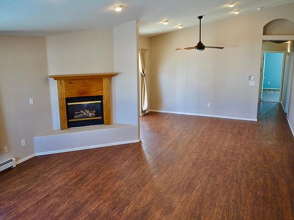 Living room, dinging area and hallway to bedrooms.