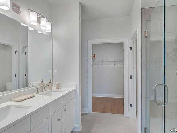 master bath with walk in closet
