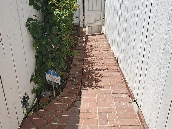 WALK WAY TO THE PROPERTY. situated IN THE BACK OF THE HOME