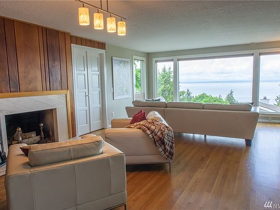 Cozy wood burning fireplace for winter book reading.