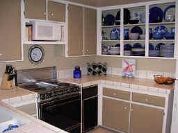 Chef's 'delight' kitchen w/glass cabinet doors aestheticly pleasing yet functional.