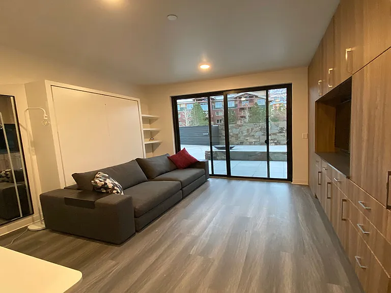 __ Another view of the studio
__ A different angle of the studio showcasing its spacious layout and modern design. Enjoy a cozy, well-equipped space perfect for relaxation and comfort during your stay.