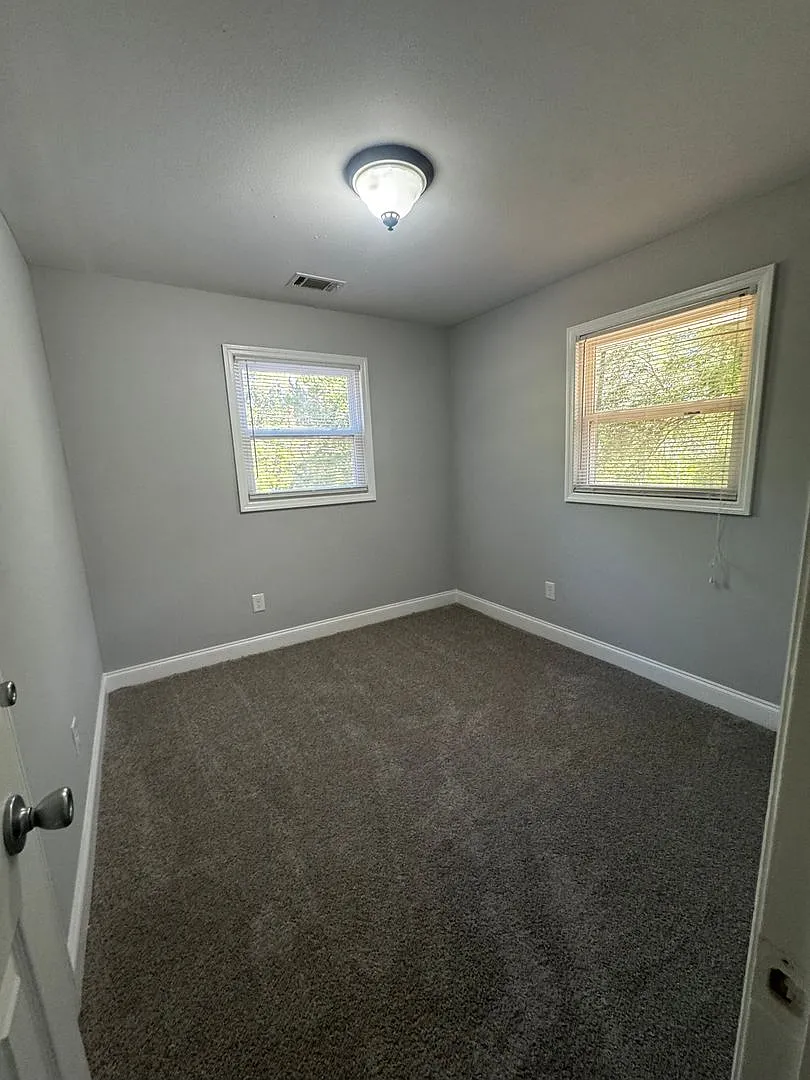 Freshly Updated 4-Bedroom Brick Home with Spacious Yard! — Photo 3