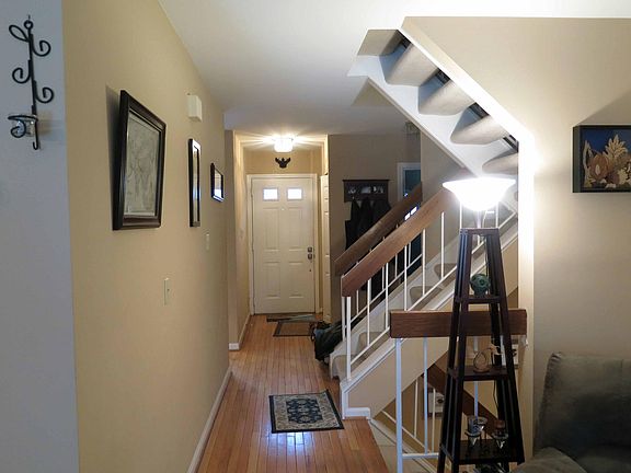 Looking from the living room on the main floor to the front 