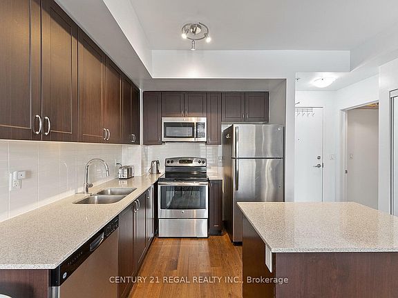 4th image of 3560 Saint Clair Ave E #302