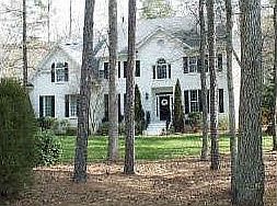Front view of house, during winter