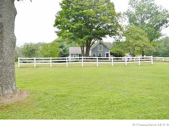 Picturesque home sits back ...