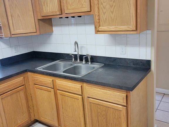 Kitchen with new counters and sink