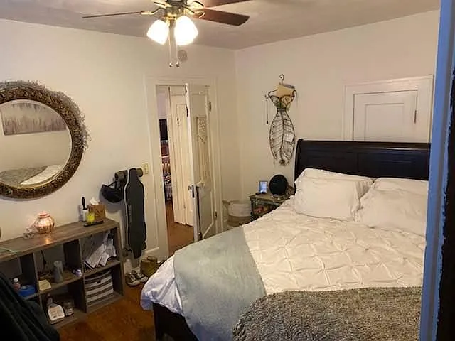 Bedroom One w/ Original Hardwood Floors. Fits king size bed.