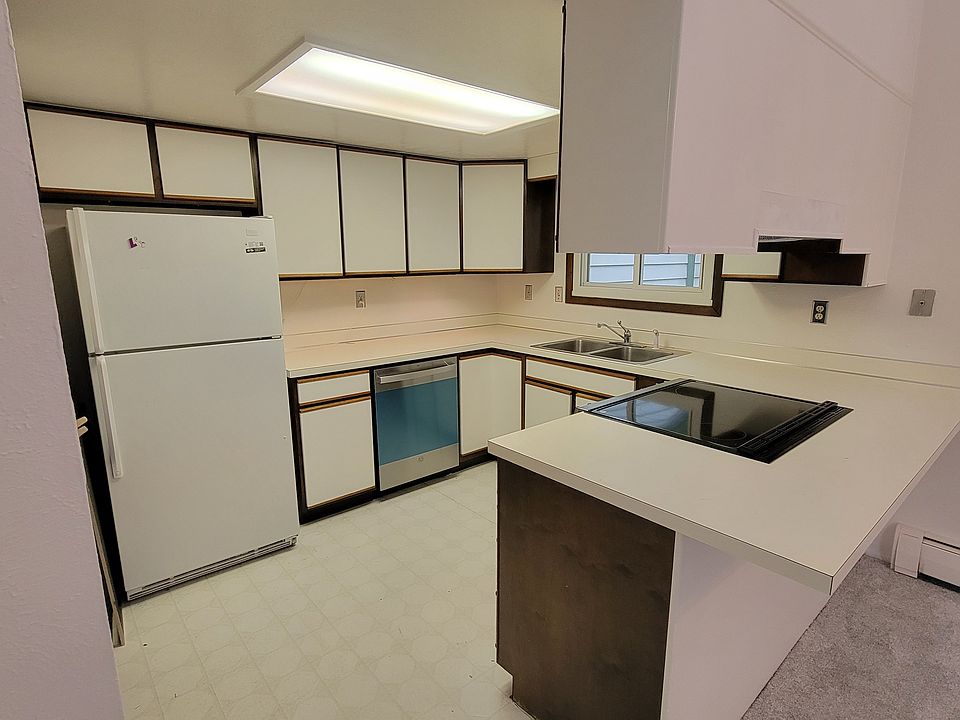 Kitchen with new range, dishwasher,