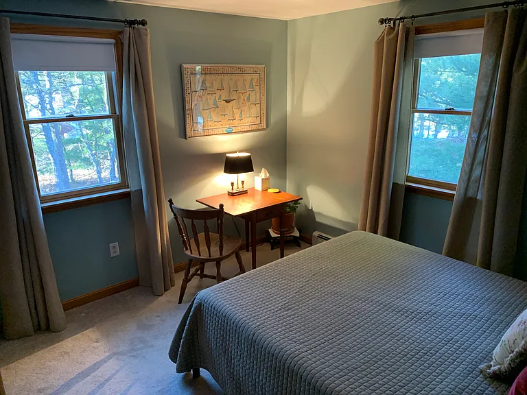 Queen bed, small drop leaf table to do your work, peaceful!
