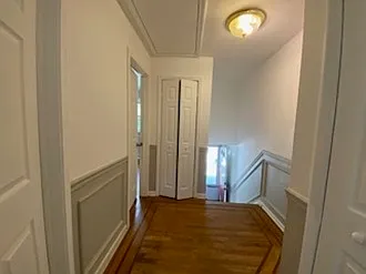 Hallway that leads to the staircase