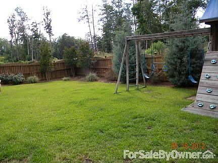 Back Yard
						:
						Great level lot gives lots of room to run and play.