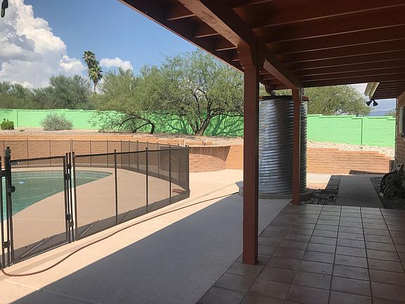 Use the two large water cisterns to fill the pool and help k