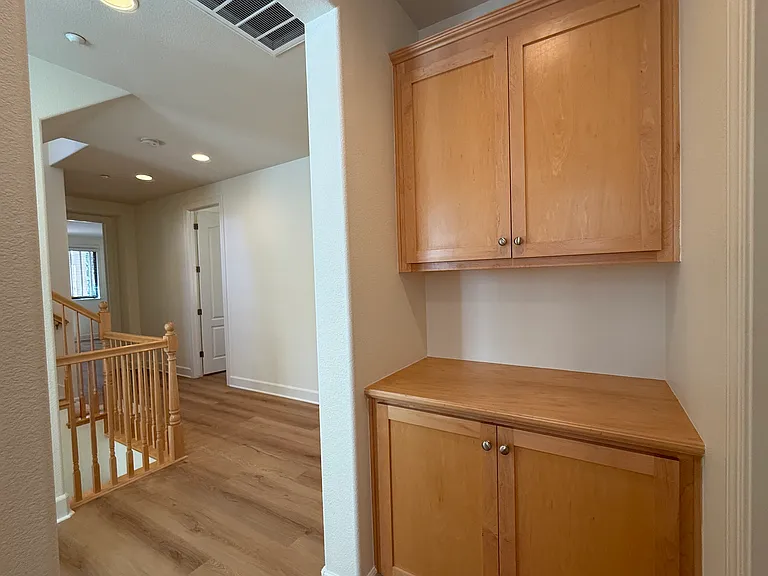 Laundry room is conveniently located on the second floor.