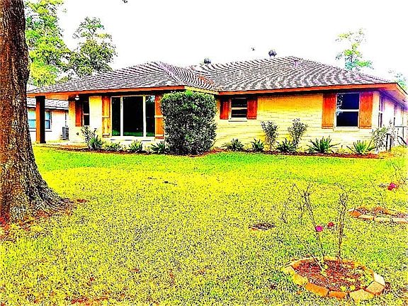 Set Back on a 12,709 sq ft  lot, one of the largest in Oak Forest.