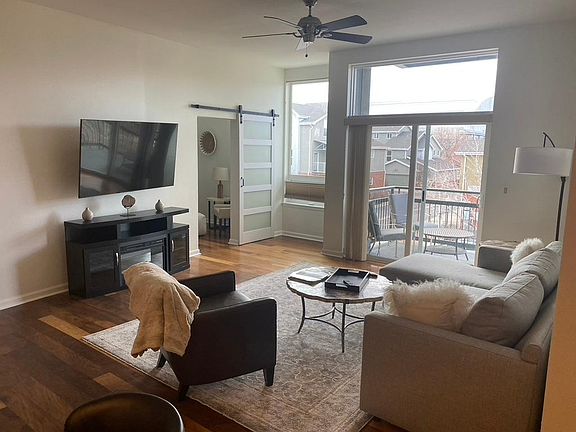 View from kitchen to living area and second bedroom