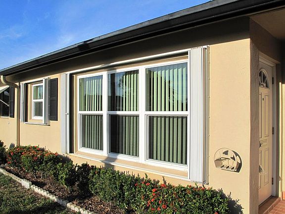 Impact windows and accordion shutters