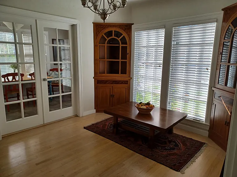 Dining room with original built-ins. Oak flooring, cleans easily.