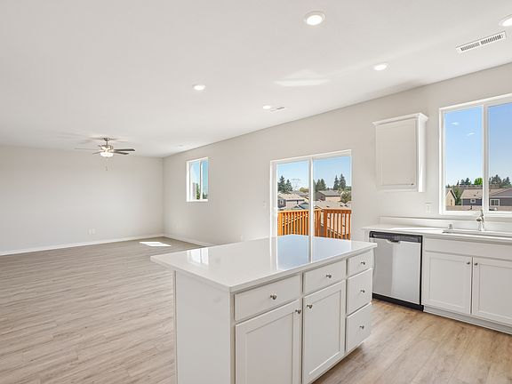 The kitchen overlooks the living area.