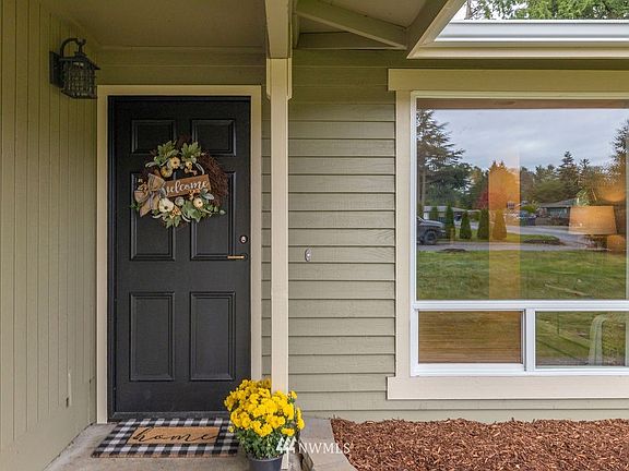 Freshly Painted Exterior with Newer Windows