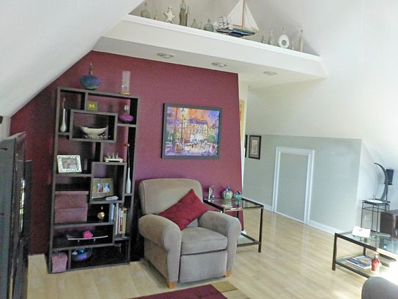 living room. Note: wall is no longer red, it's the same color as the other walls