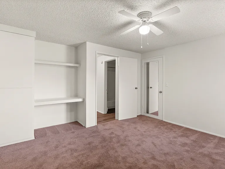 Roomy Tacoma bedroom with ceiling fan and extra built-in storage. Roomy Tacoma bedroom with ceiling fan and extra built-in storage.