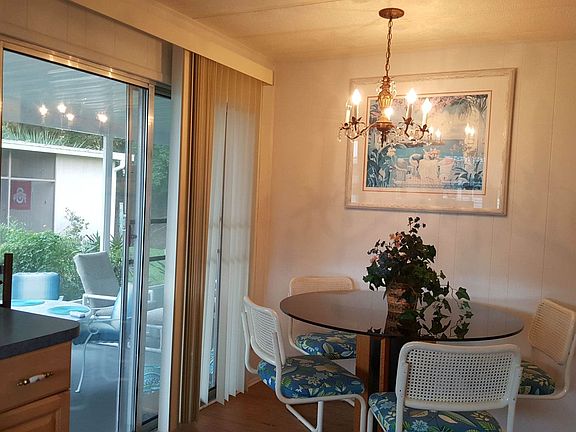 Dining table adjacent to kitchen