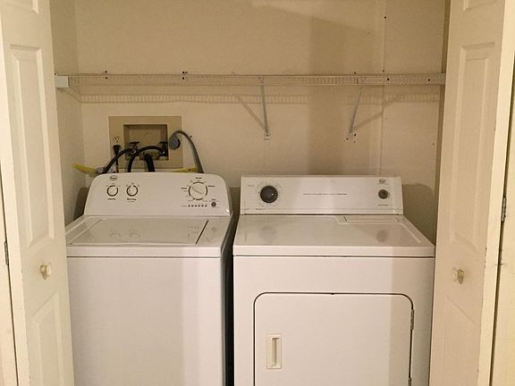 Washer/Dryer adjacent to kitchen and dining area
