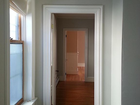 From bedroom #1 through bedroom #2 to front room