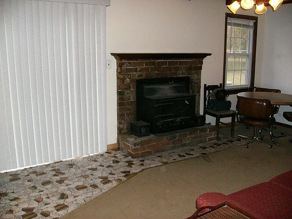 Family Room with Woodstove and Patio Doors