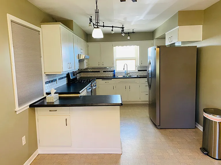 8837 Manor Ave — Photo 10