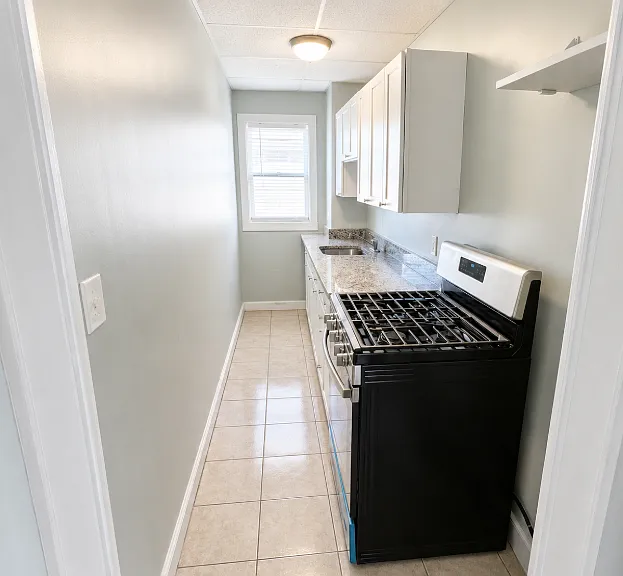 766 Plymouth Ave Fall River MA Spacious 3BR, 1BA w/ Large Master & Off Street Parking — Photo 2
